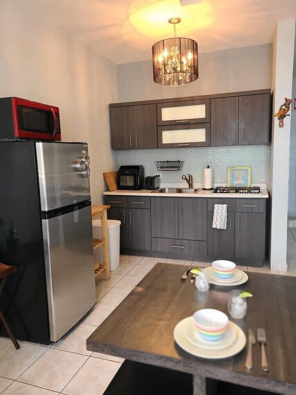 FULL KITCHEN. FULL REFRIGERATOR AND SEATING FOR 4. FOLDING TABLE AVAILABLE 