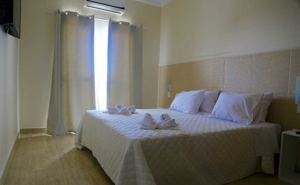 Minibar, blackout drapes, bed sheets