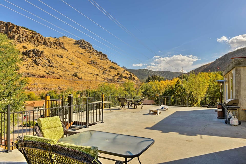 Enjoy mountain views from the furnished upper patio.