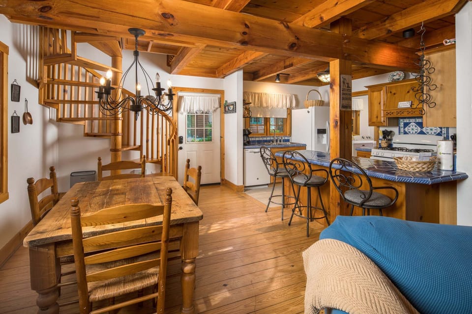 The dining area flows seamlessly into the kitchen, making it easy to gather for meals