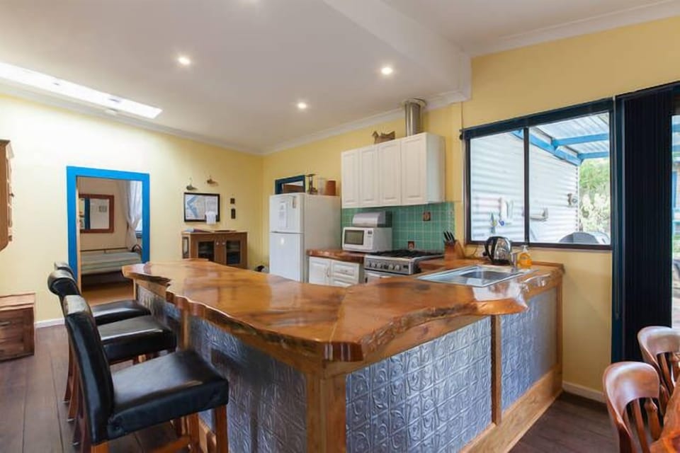 Kitchen counter made out of slab of pine