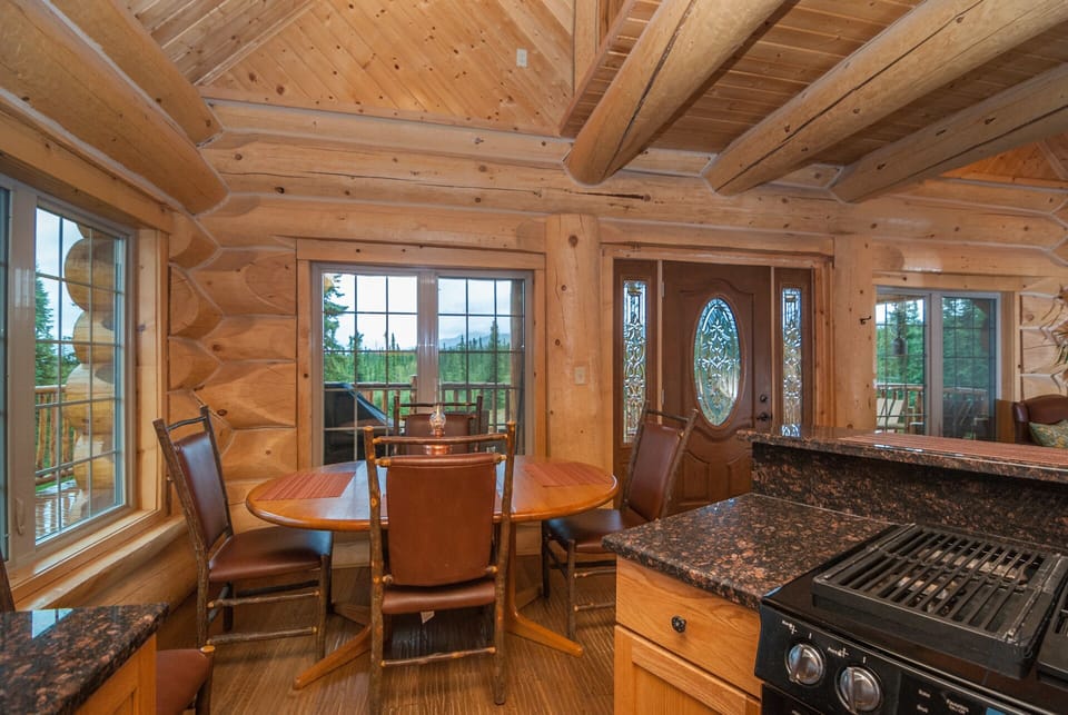 View from kitchen to dining area and main entrance.
