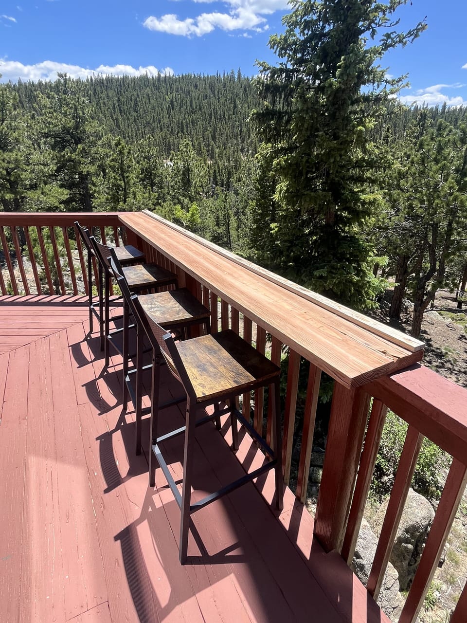A bar area on the wrap around deck where you can enjoy a cocktail and the view.