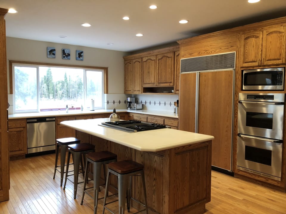 Main floor kitchen with breakfast bar