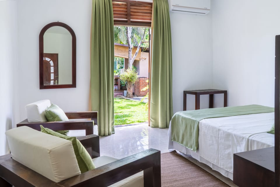 Deluxe Double or Twin Room, 1 Bedroom, Garden View | Blackout drapes, iron/ironing board, bed sheets