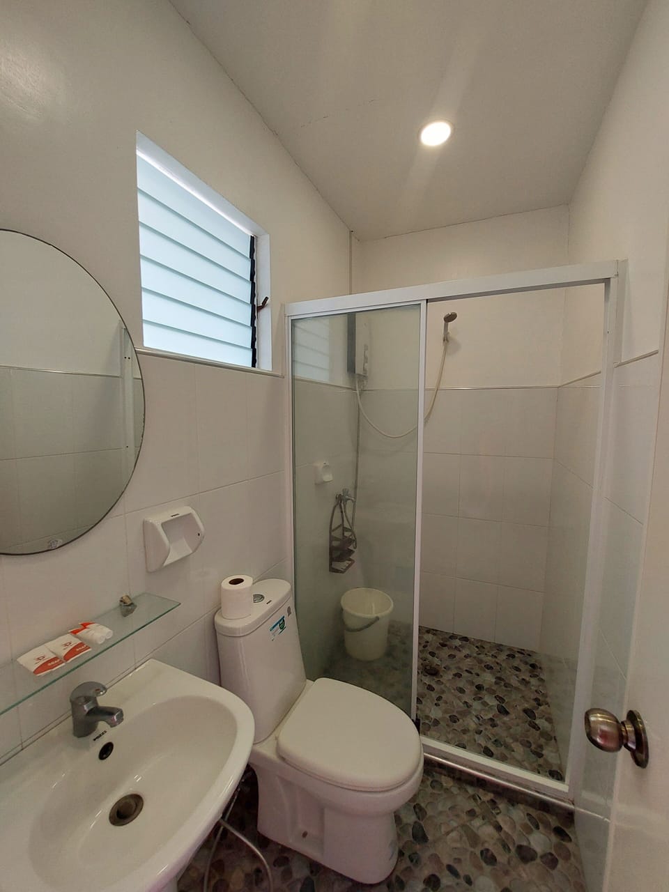 Shower, rainfall showerhead, bidet, towels