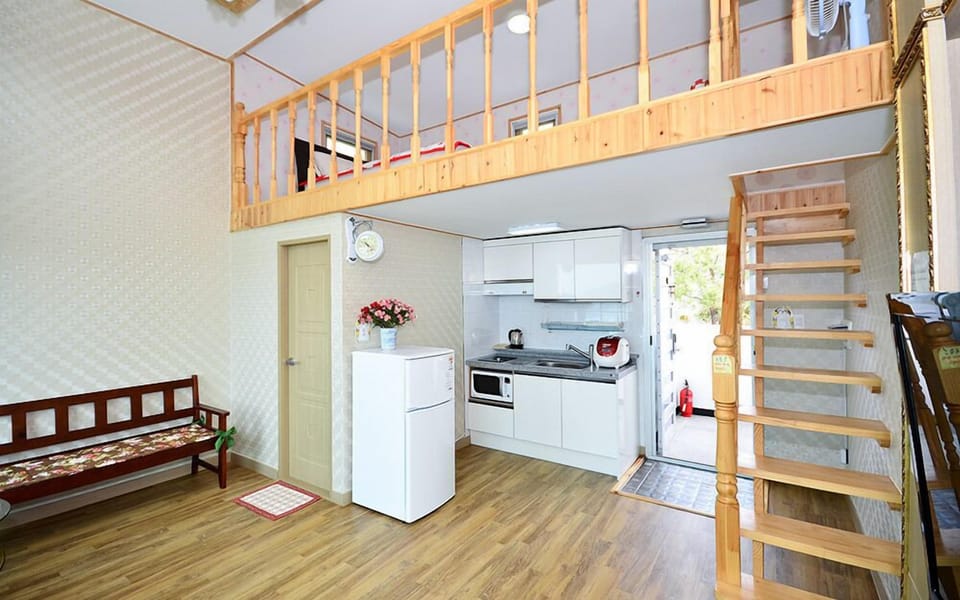 Elite Duplex (2 Guest Rates, Extra person Charge on spot - 1-13yr 10,000KRW, 14yr above 20,000KRW pp | Living area | Flat-screen TV