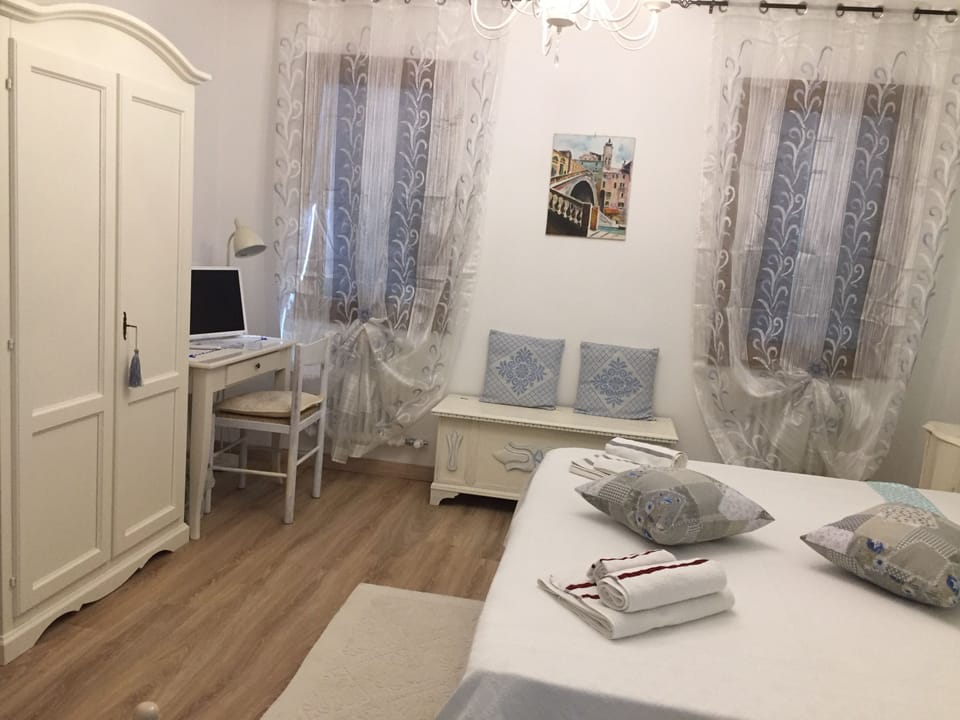 Romantic Twin Room, River View | In-room safe, desk, iron/ironing board, free WiFi
