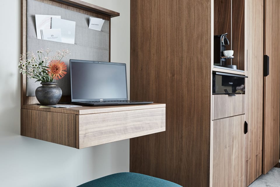 Premium bedding, free minibar items, in-room safe