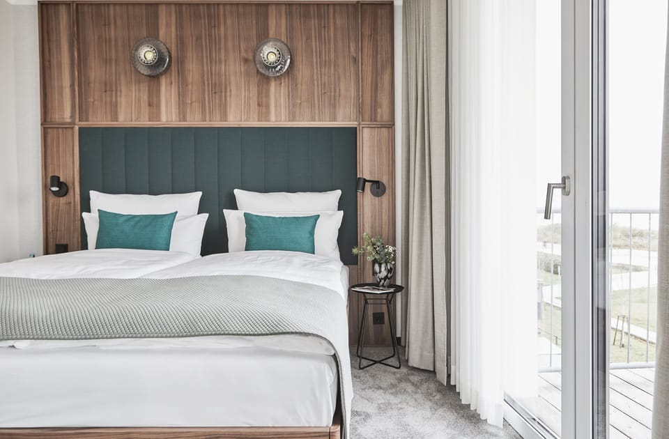 Premium bedding, free minibar items, in-room safe