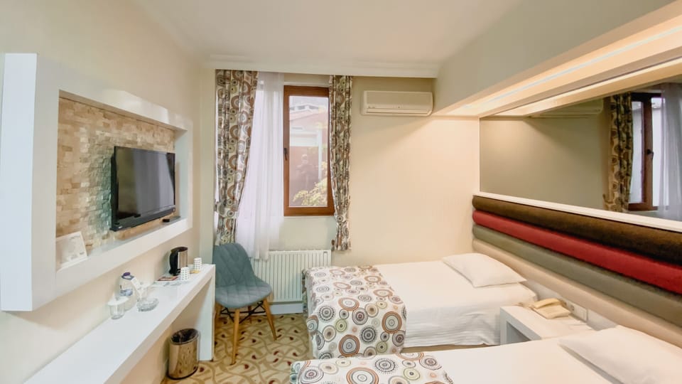 Standard Room with Garden View | Premium bedding, minibar, desk, laptop workspace