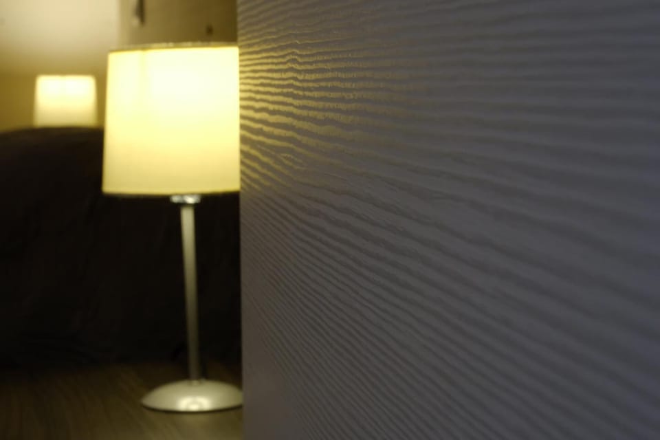 Premium bedding, down comforters, minibar, desk