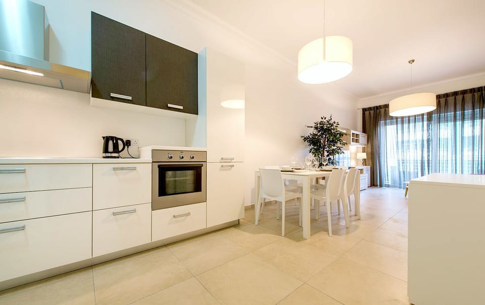 Apartment, 1 Bedroom | Private kitchen | Full-size fridge, oven, coffee/tea maker, toaster