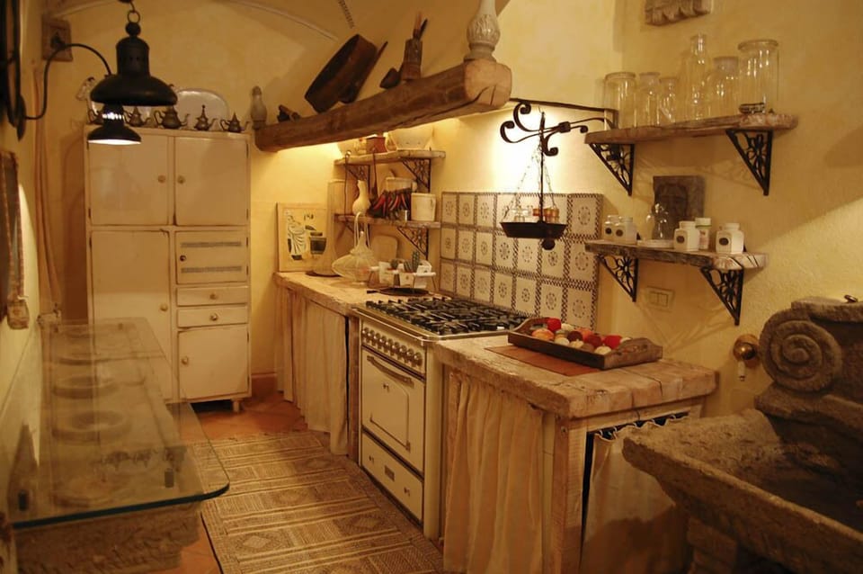 Apartment, 3 Bedrooms | Private kitchen | Full-size fridge, microwave, oven, stovetop