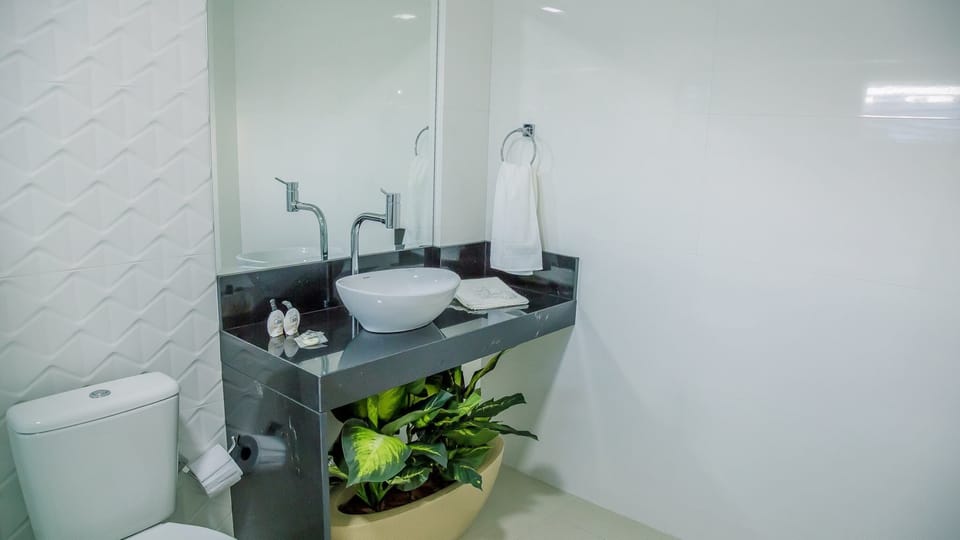 Shower, rainfall showerhead, towels
