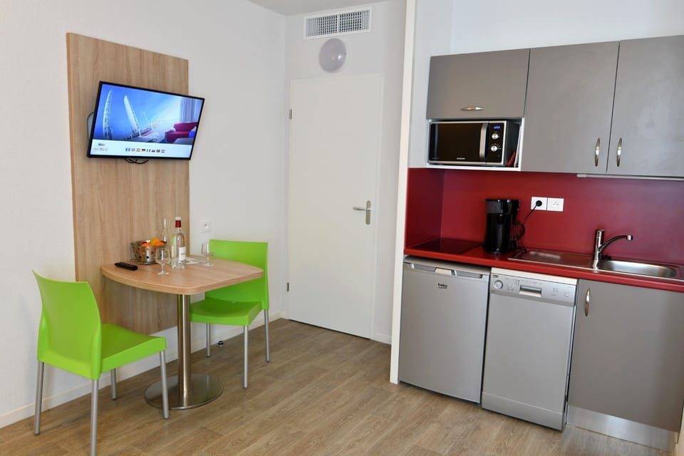 Make a quick meal in your kitchen while watching a show on television.