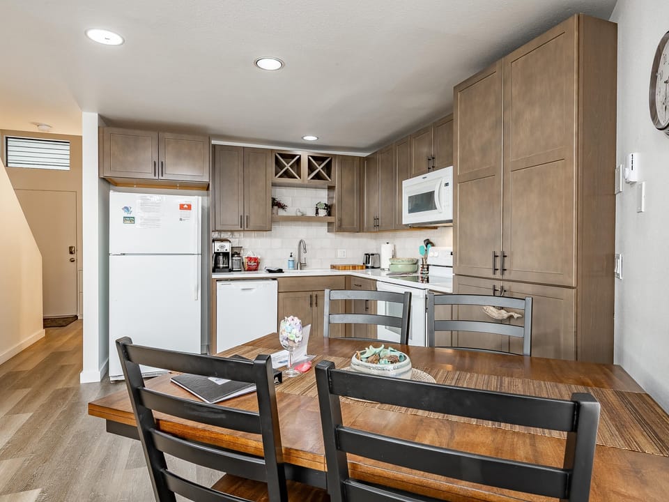 Cozy kitchen with modern amenities and warm wood accents