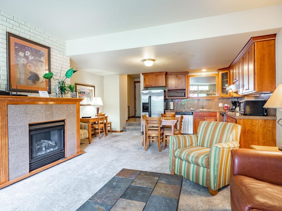 Living area-electric fireplace-kitchen