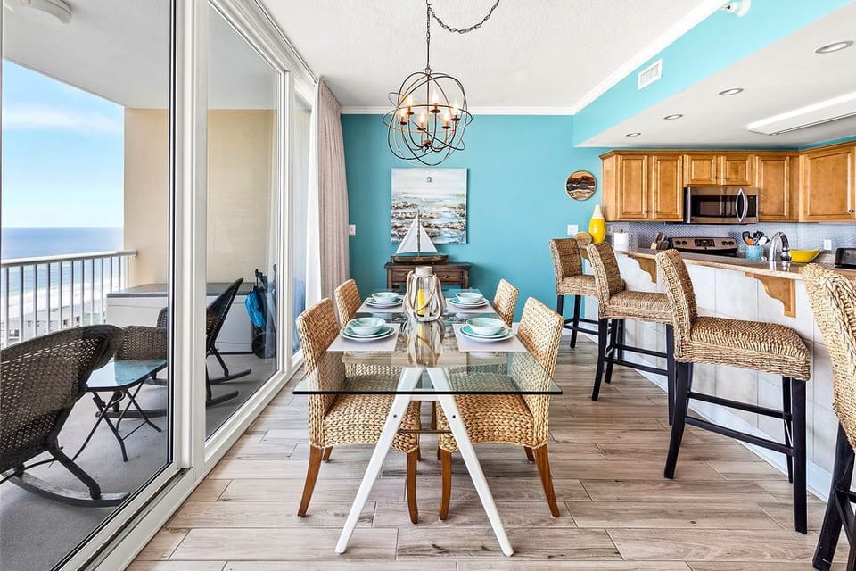 Comfortable seating for four at the table or bar, with amazing views of the Gulf