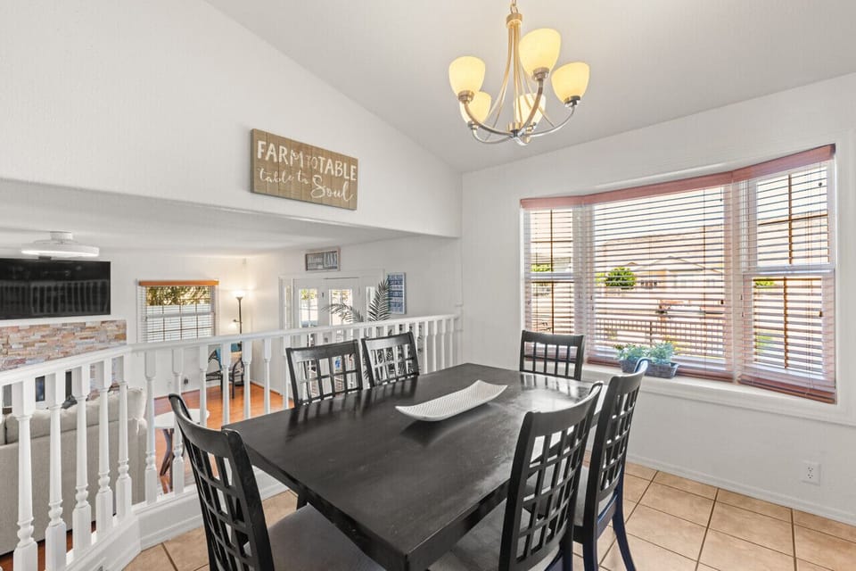 Seating for 6 with views of the lake as well as the living room TV
