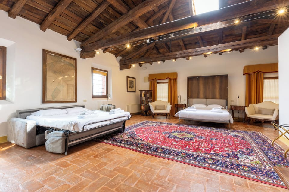 Executive Quadruple Room | Individually furnished, desk, laptop workspace, blackout drapes