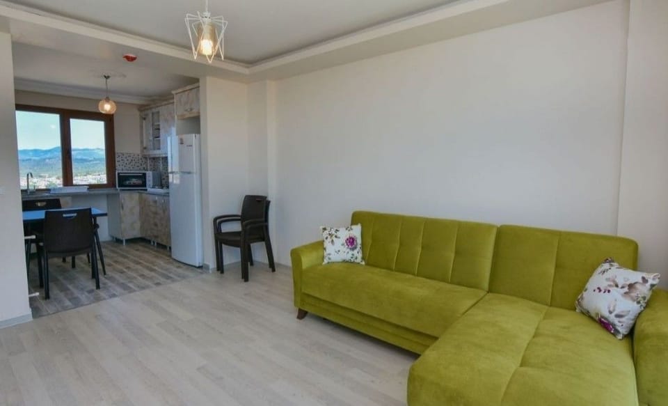 Family Suite, 1 Queen Bed with Sofa bed, Kitchen, Sea View | Living area | LCD TV