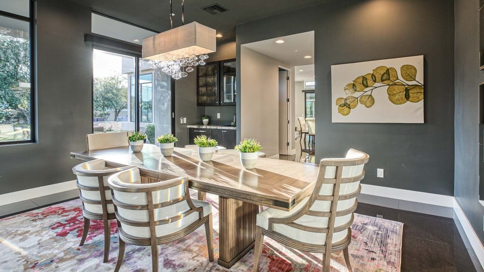 Formal dining room w/ 6 chairs in separate room for quiet dining experience