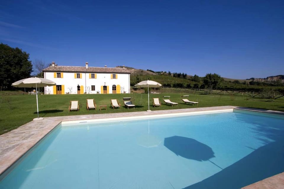 Seasonal outdoor pool, pool umbrellas, sun loungers