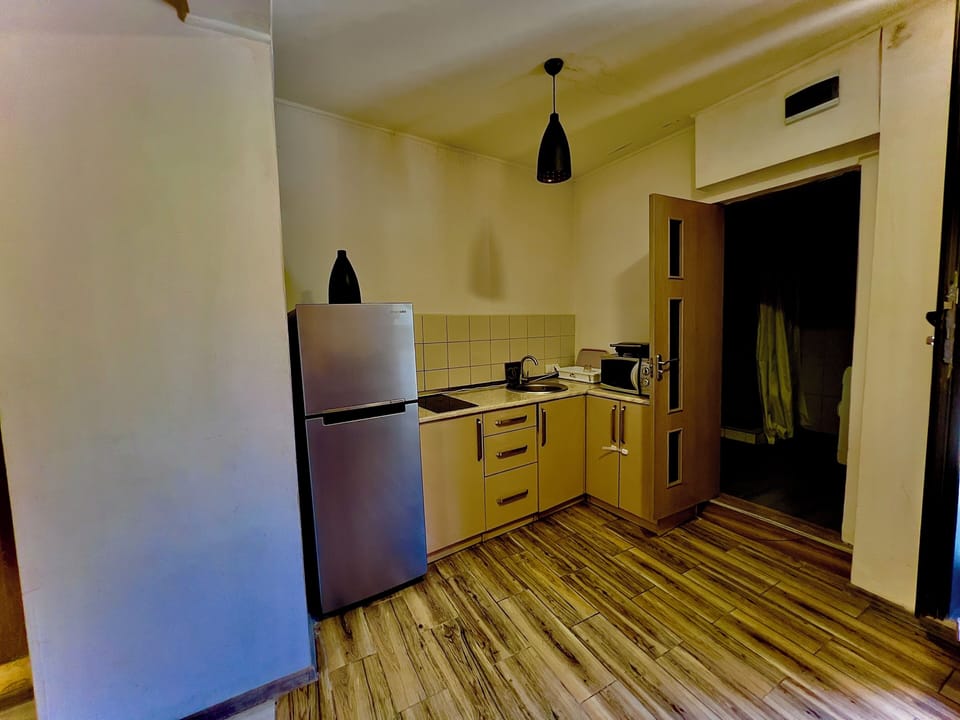 Family Room | Private kitchen | Oven, stovetop, coffee/tea maker, electric kettle