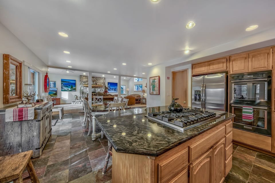 With a large island this kitchen has plenty of extra counter space for all those helping hands