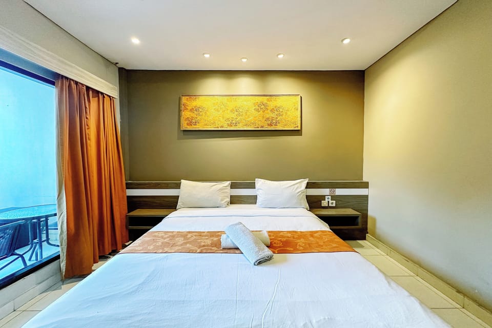 Deluxe Room | 1 bedroom, premium bedding, desk, free wired internet