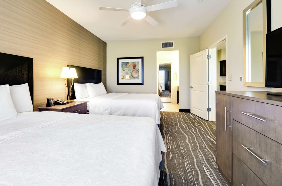2 Bedroom Suite, 1 King, 2 Queens, Sofa Bed | In-room safe, desk, blackout drapes, iron/ironing board