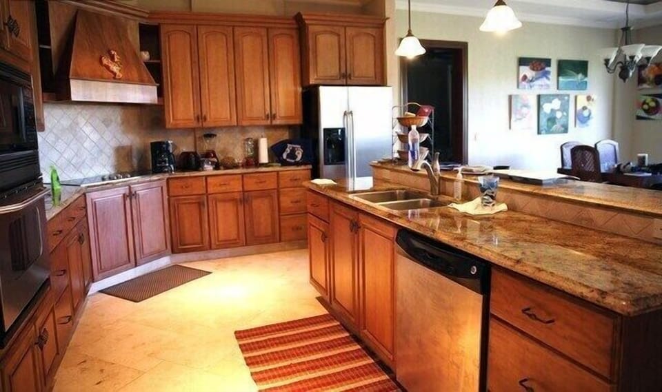Gourmet kitchen.  Granite. Adjacent wet bar provides 2nd sink