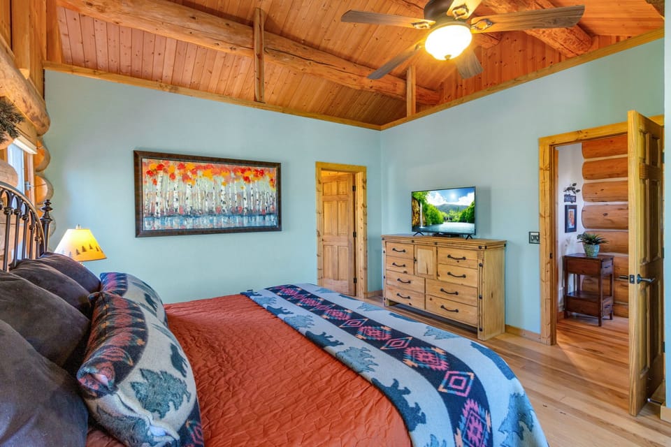 Flat screen TV and plenty of dresser space along with a large walk-in closet