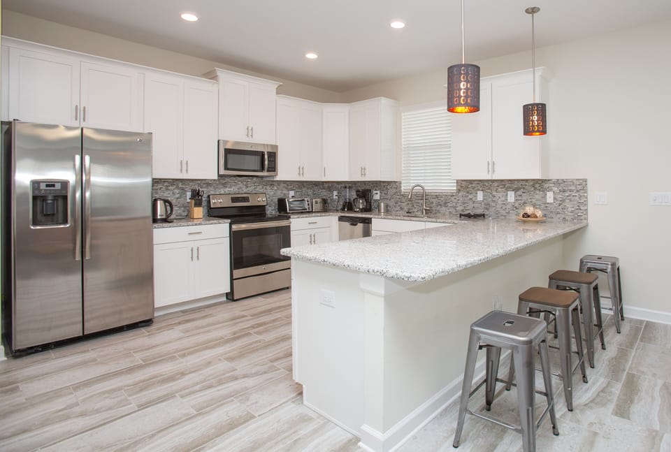 Kitchen area, included coffee maker, toaster, blender, kettle and more. all new