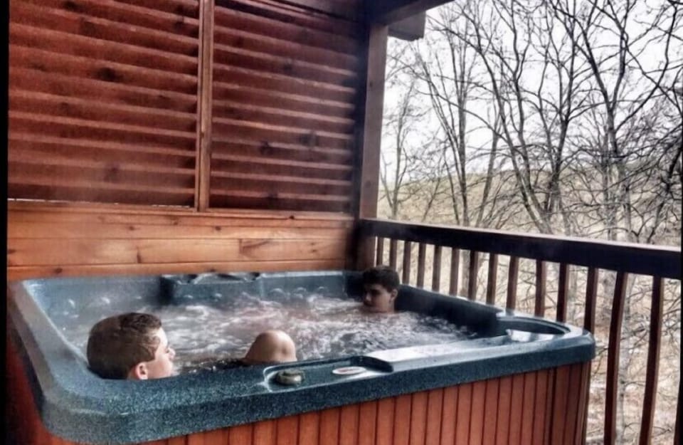 Private Hot Tub 
First Floor Balcony 
Porch Swing