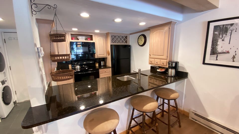 Kitchen with barstools