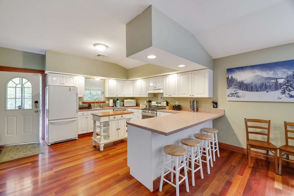 So many amazing meals and memories made in this kitchen. That door leads to the front patio (one of three decks).
