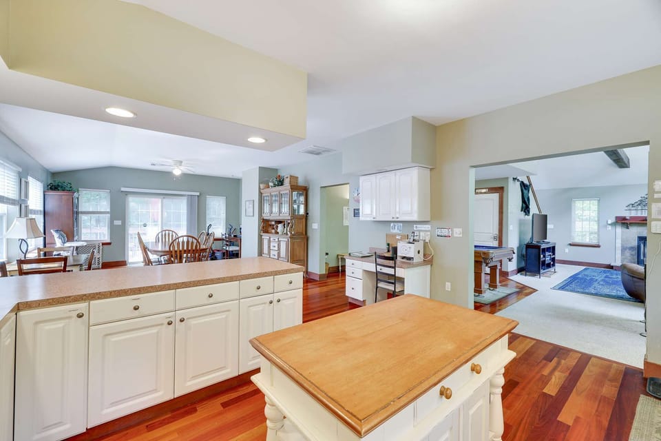 Huge Kitchen, island, peninsula bar area, open dining, and even a desk (try to avoid work at all costs!)