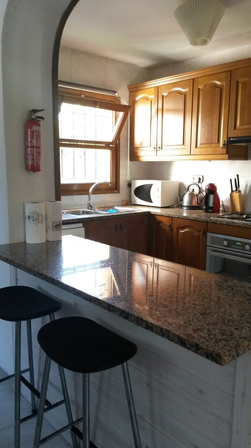 kitchen/breakfast bar area off main lounge