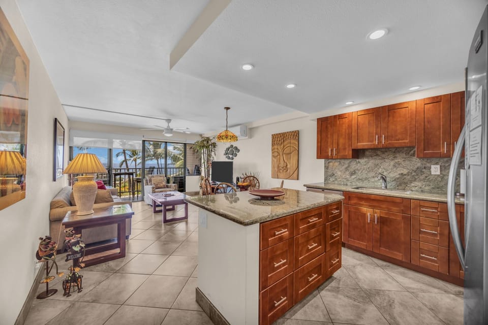 A spacious, sunlit living area that blends modern style with tropical charm.