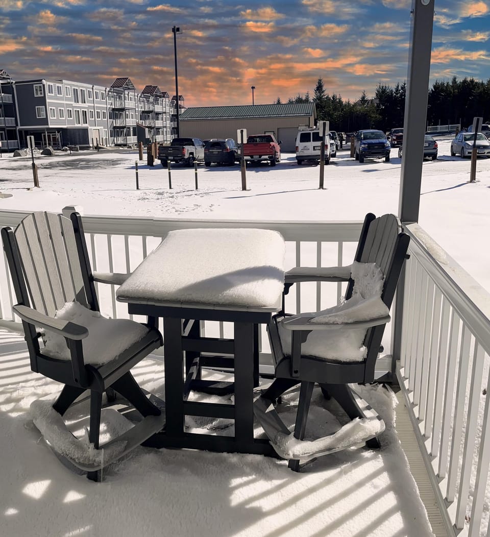 Enjoy relaxing on the new 7'x7' galvanized steel deck with seating for two people.