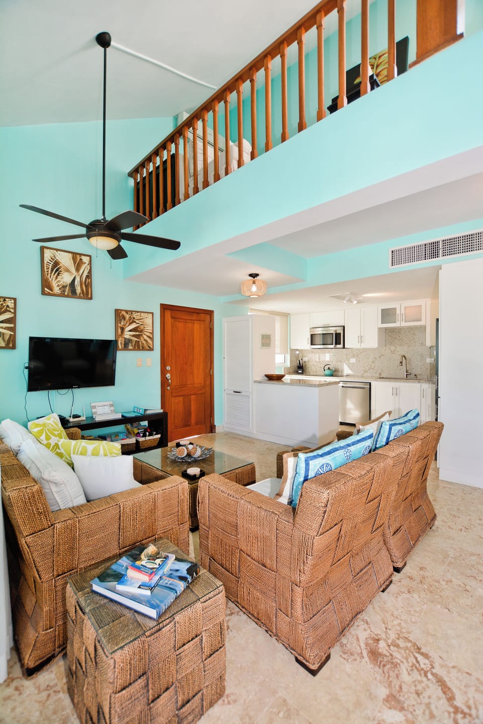 Soaring ceilings draw the eye up to a spacious loft overlooking the main level 