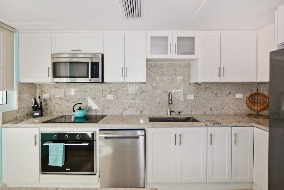 Sleek cabinetry and modern appliances including a dishwasher!