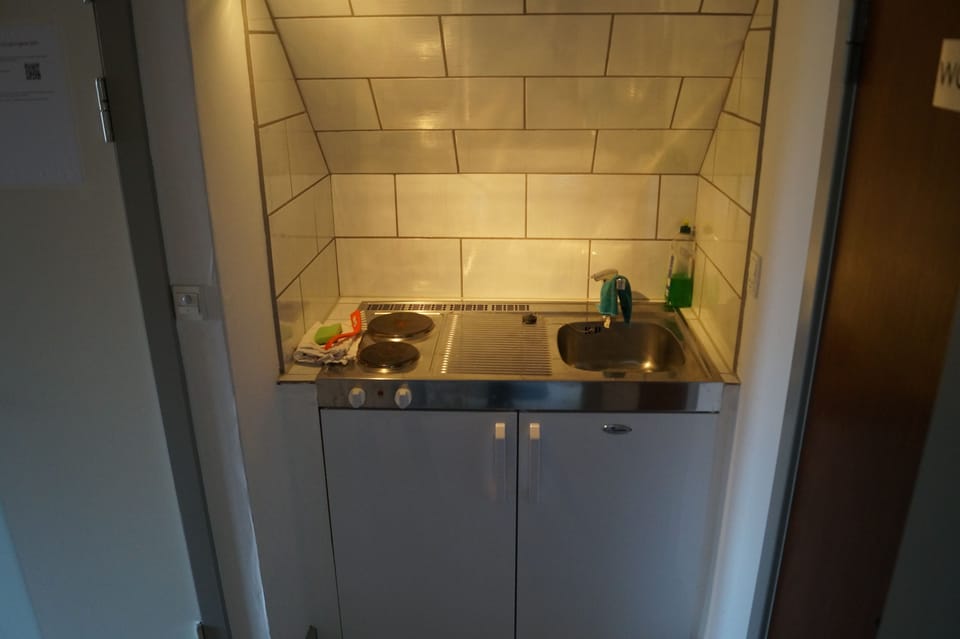 City Apartment, 2 Bedrooms, Non Smoking | Private kitchen | Oven, griddle, cookware/dishes/utensils, cleaning supplies