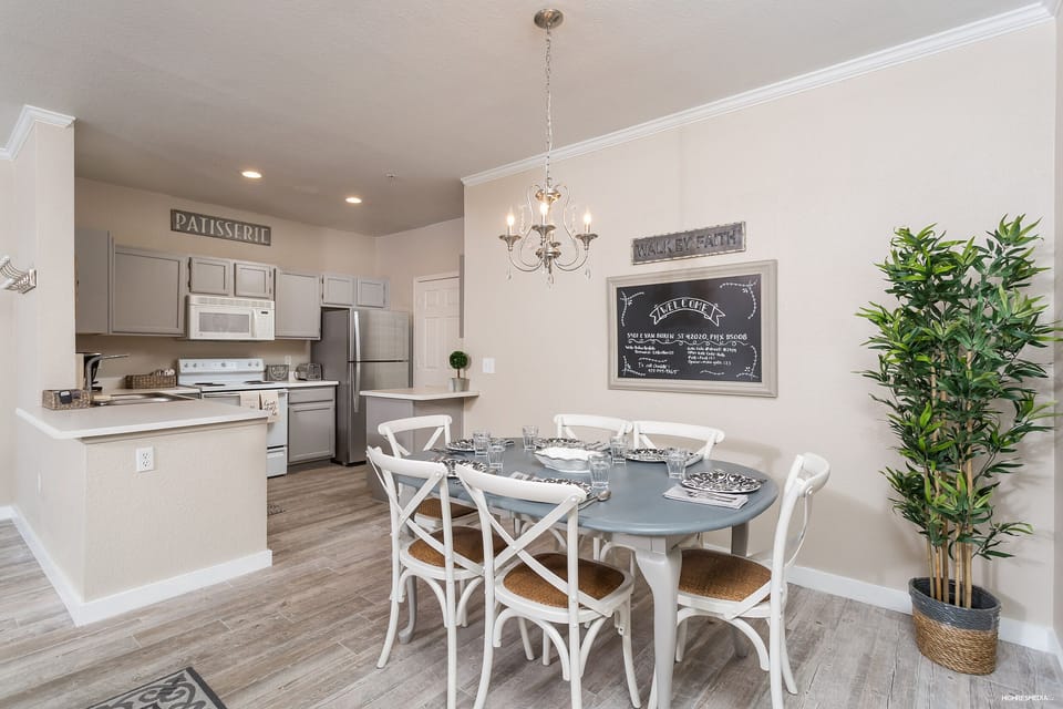 Seating for 6 at the table with plenty of dishes to choose from.