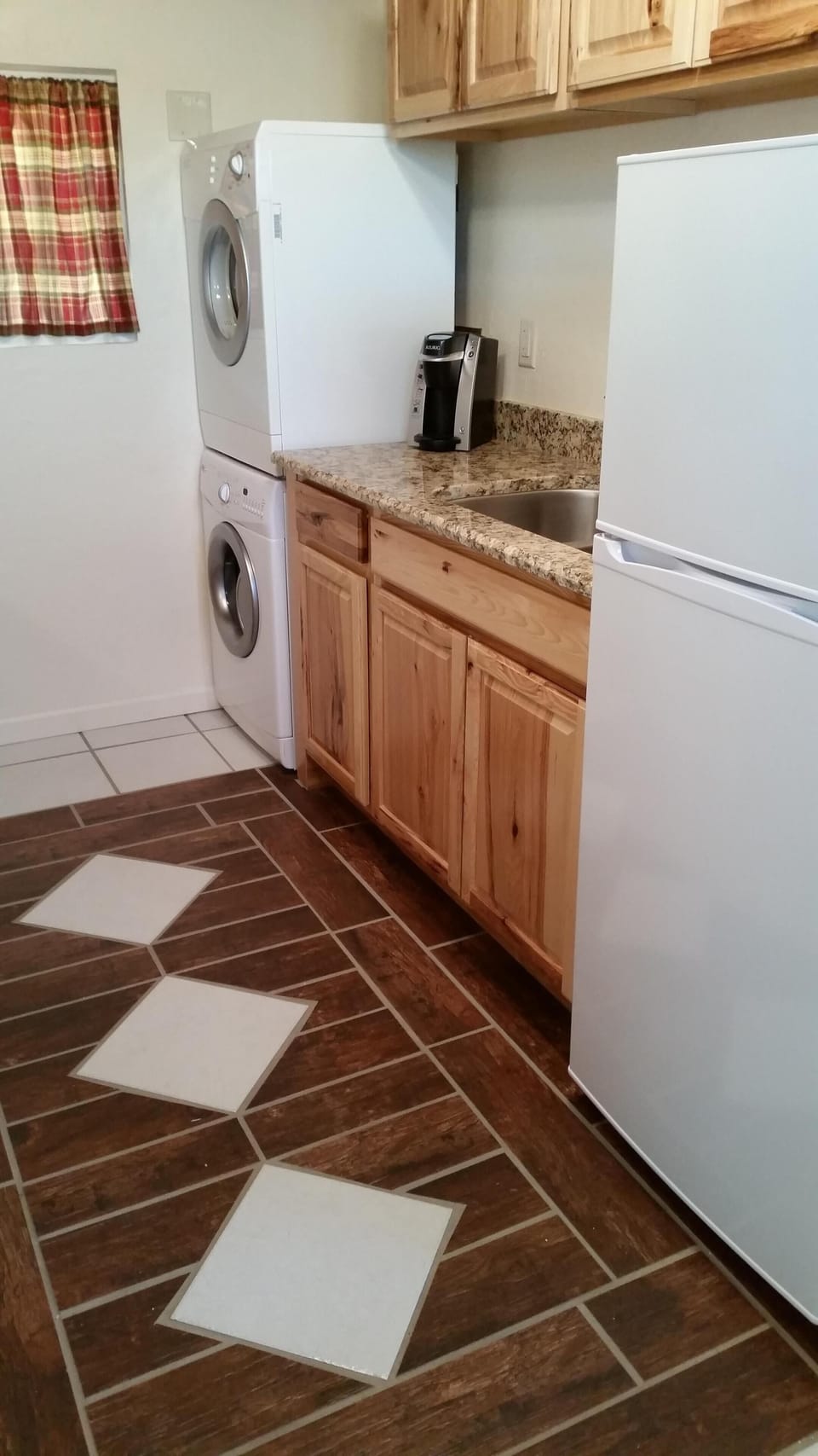 Washer and Dryer in kitchen.