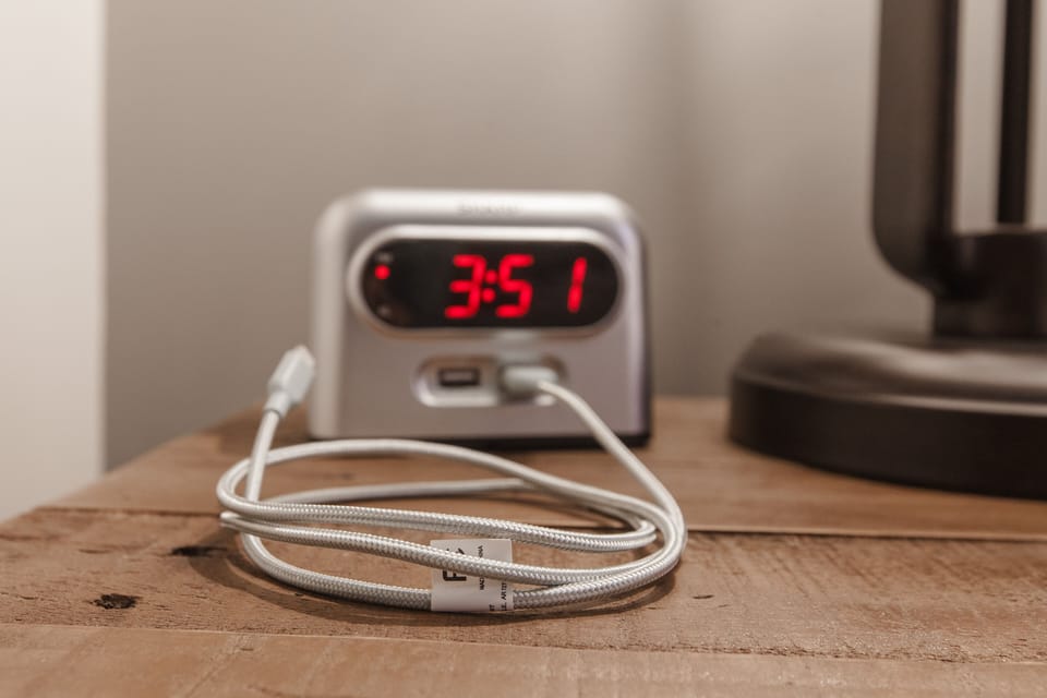 Digital clocks and charging cords in all bedrooms