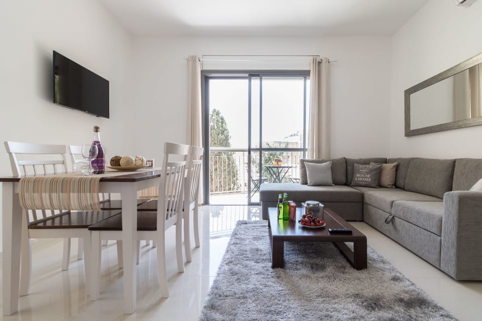 Comfort Apartment, 1 Bedroom | Living area | Flat-screen TV