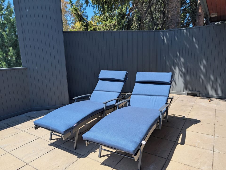 Private deck off primary suite overlooks Drake Park, Mirror Pond, Old Bend.